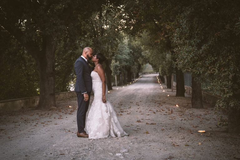 bride and groom kiss