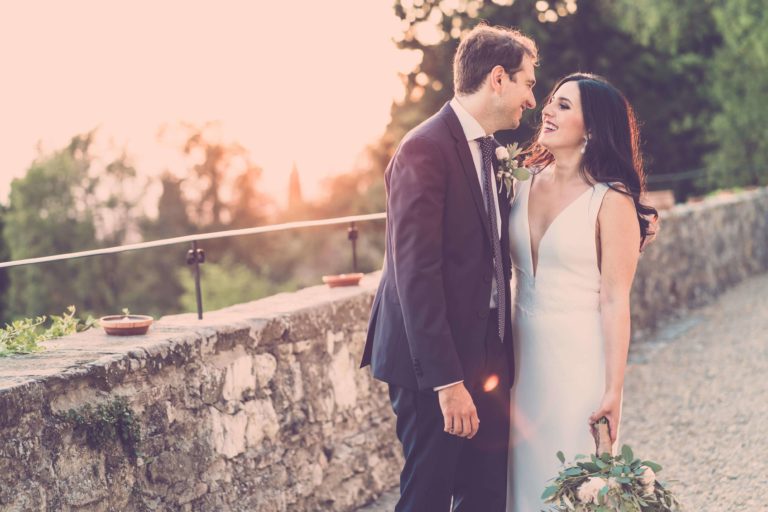 bride and groom at the sunset