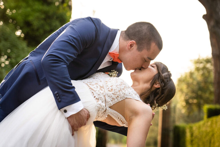 bride and groom kiss